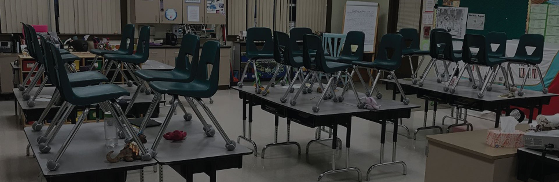 School classroom showing chairs with cut tennis balls on legs